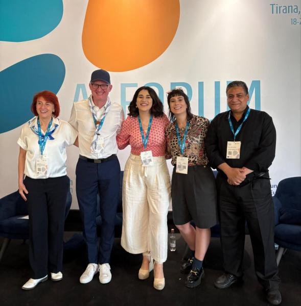 A photo with a group of participants to the session titled: Seeds of Dialogue: Youth-led Tools for Trust and Transformation