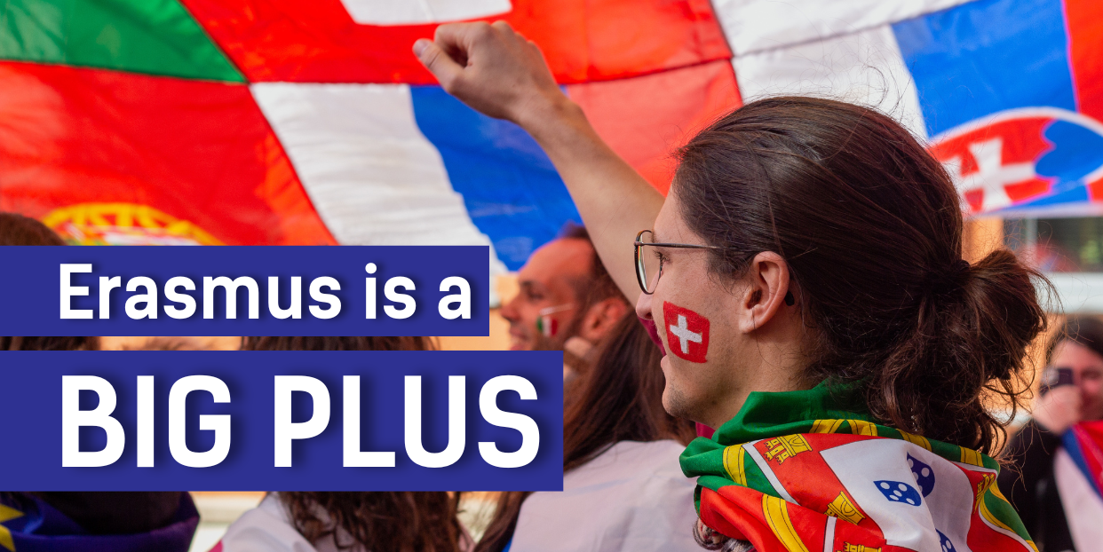 A photo of a person with the Switzerland flag drawing on their face while being surrounded with other big flags. The text says: "Erasmus is a BIG PLUS."