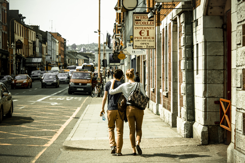 couple walks in the street