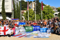A picture of a big group of people with different ESN and country flags.
